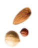 Three single raw almond nut pieces spaced apart